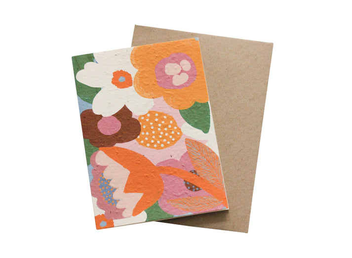 A Moon Flower Plantable Card with a colorful floral design on the front, a recycled paper envelope, and blank interior.